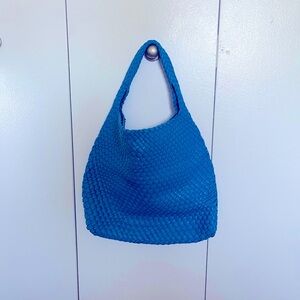 Blue woven tote bag